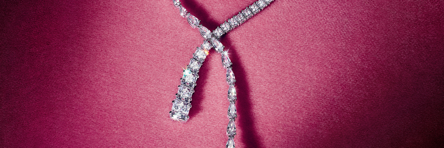 Holiday gifts and jewelry laid out on a table